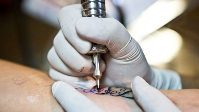 Tattoos help Israelis scarred by attacks and war